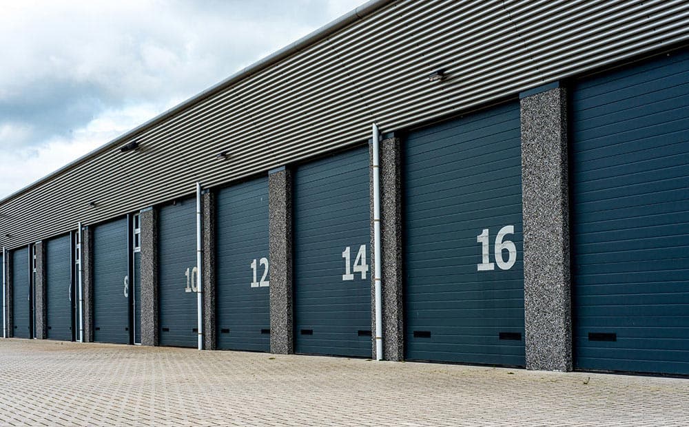 Row of numbered drive-up storage doors